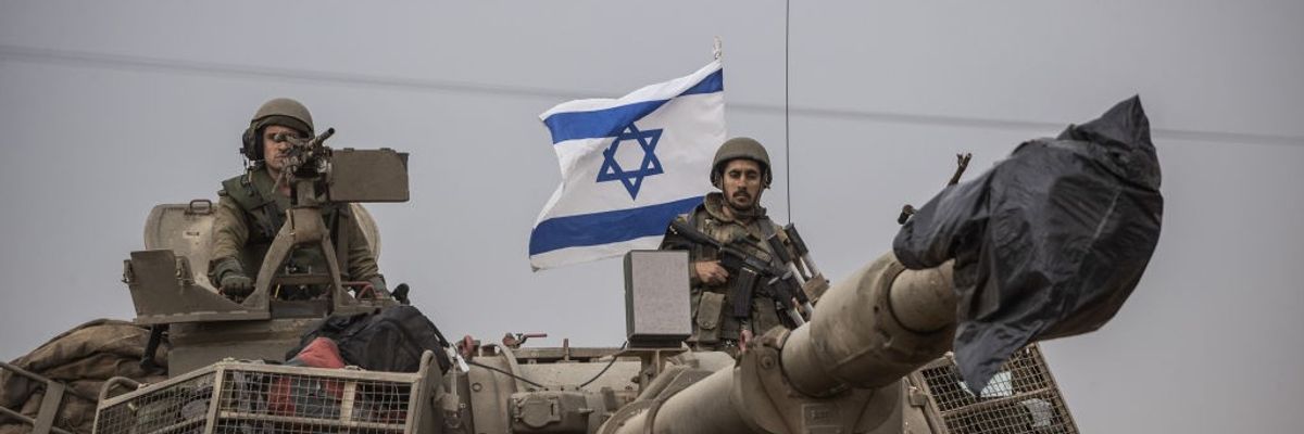 Military vehicles deployed at Gaza border in Sderot
