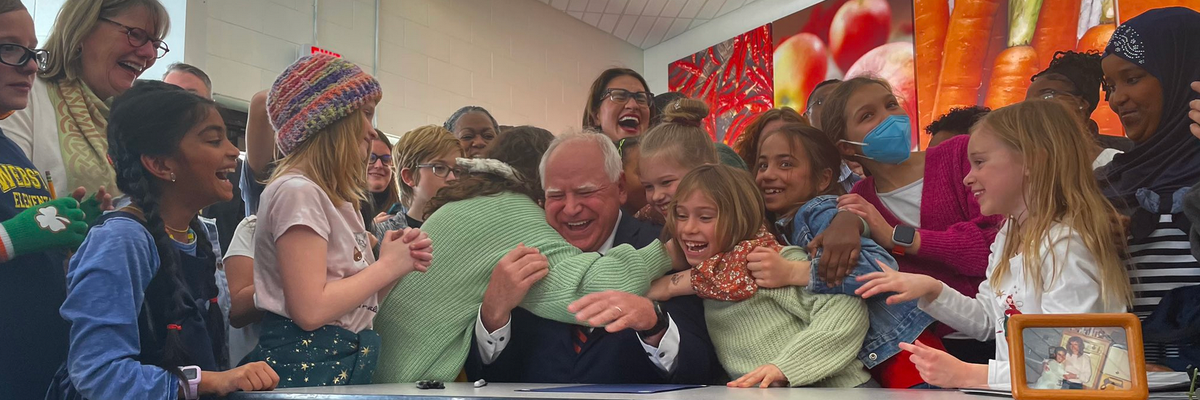Minnesota Gov. Tim Walz hugs students