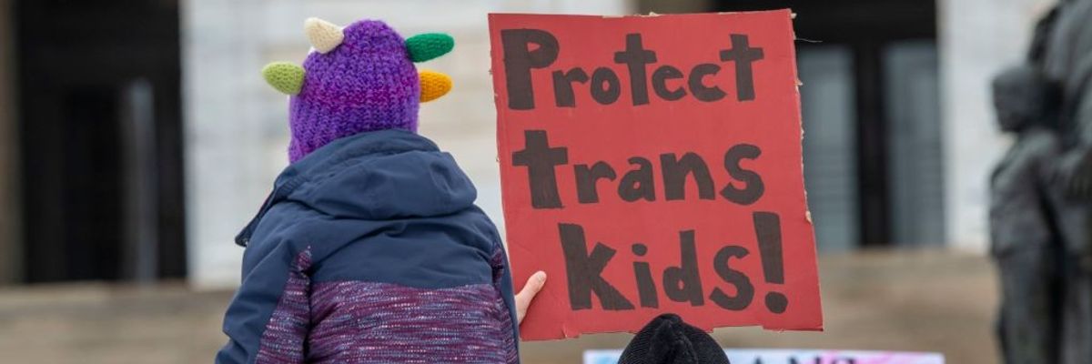Minnesotans hold a rally at the Minneapolis to support transgender kids