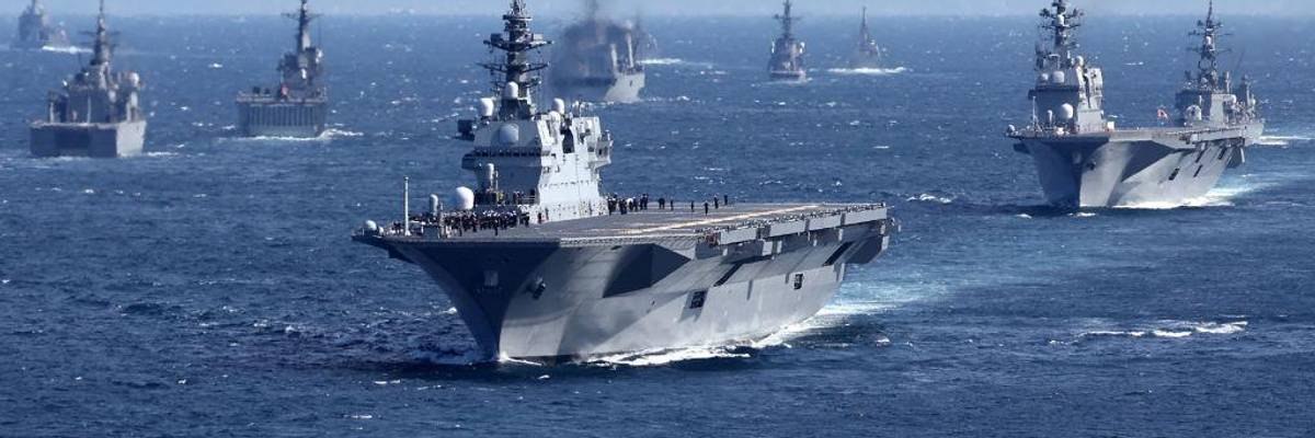 Mlitary vessels, including Japan's Maritime Self-Defense Force's largest escort ship "Izumo," at sea