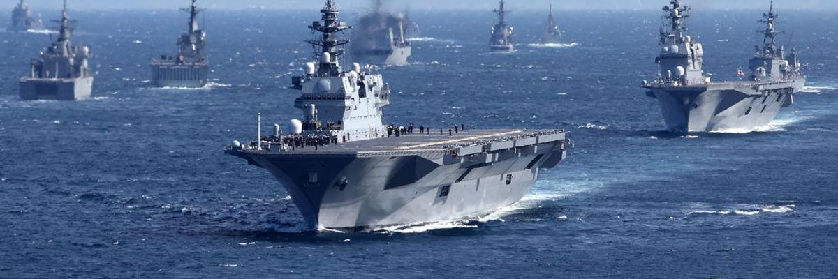 Mlitary vessels, including Japan's Maritime Self-Defense Force's largest escort ship "Izumo," at sea