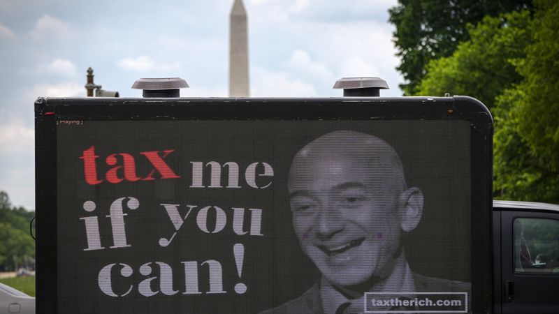 Mobile Billboard Moves Around DC In Tax Day Protest