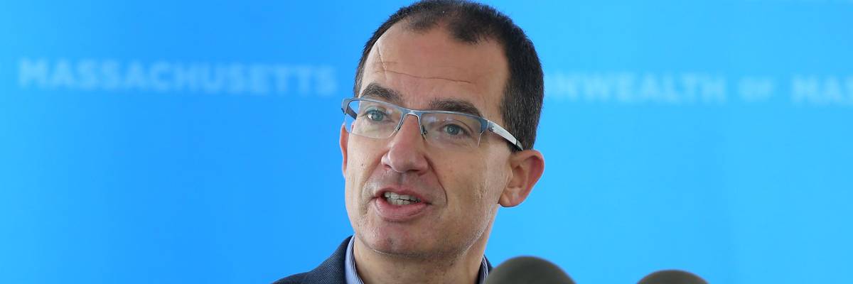 Moderna CEO Stephane Bancel speaks to reporters