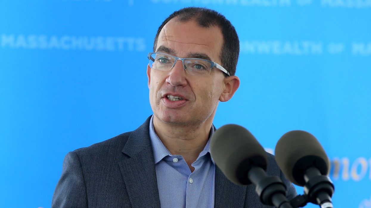 Moderna CEO Stephane Bancel speaks to reporters