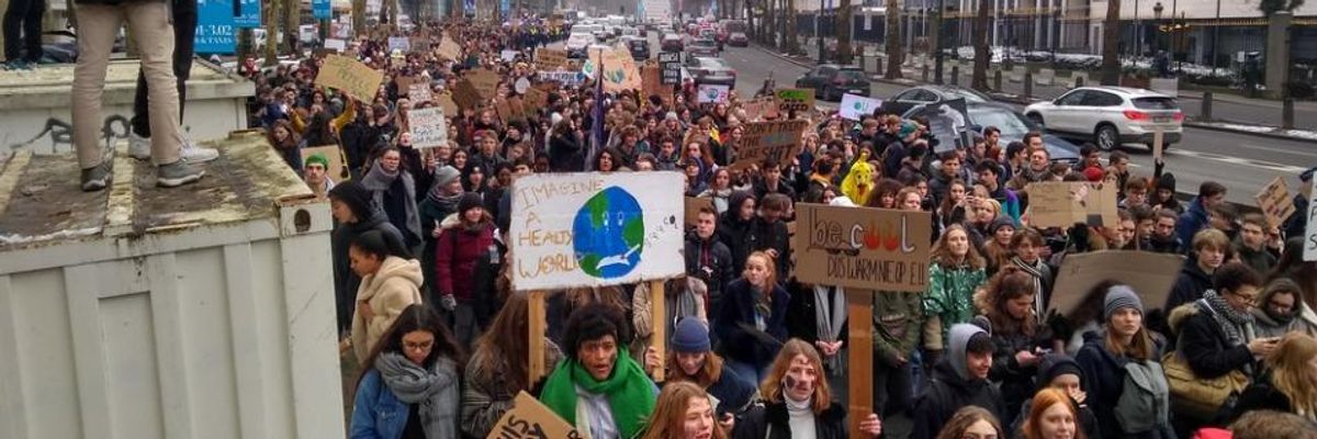 'March Now or Swim Later': As Elites Chit-Chat in Davos, Climate Strike Swells With 35,000 Students Marching in Brussels