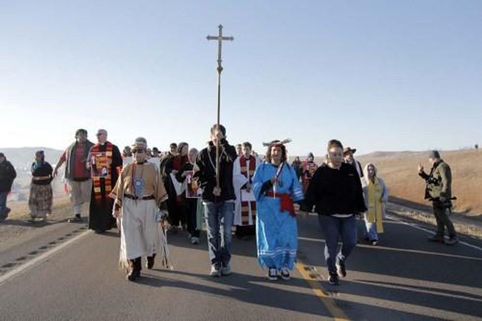 More than 500 interfaith witnesses marched north along Highway 1806 to the backwater bridge where they formed a Niobrara Circle of Life.
