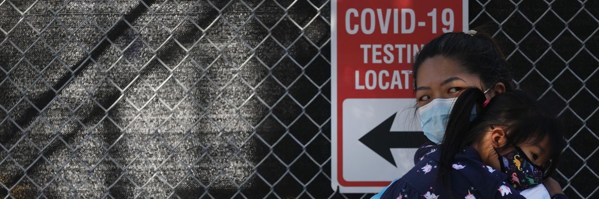 Mother and child waiting for Covid testing