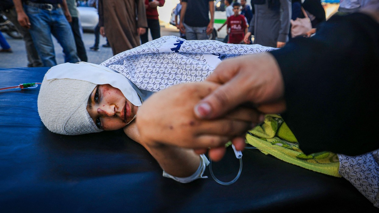 Mother comforts her child