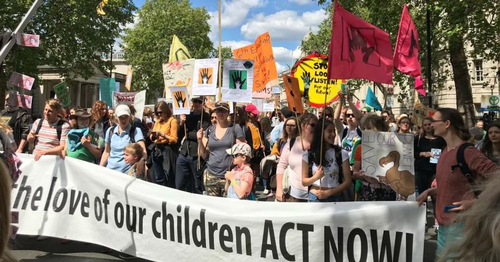 Mothers marched across the globe on International Mother's Day to demand climate action. (Photo: Emily Tempest/Twitter)