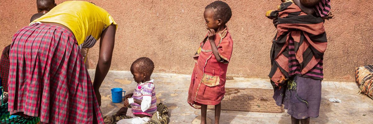 Mothers stay with malnourished children at Kaabong hospital in Uganda