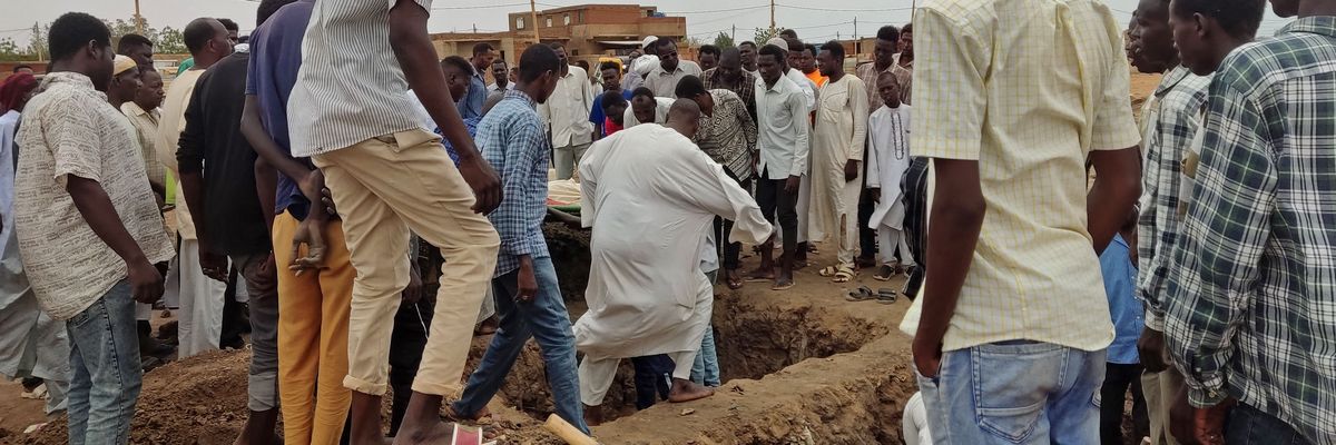 Mourners gather to bury victims