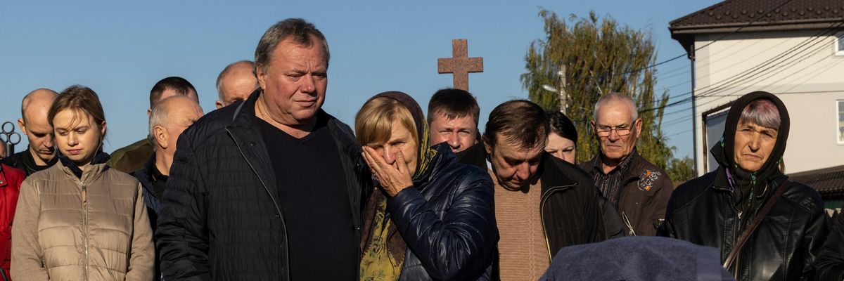 Mourners say goodbye to a loved one in Ukraine
