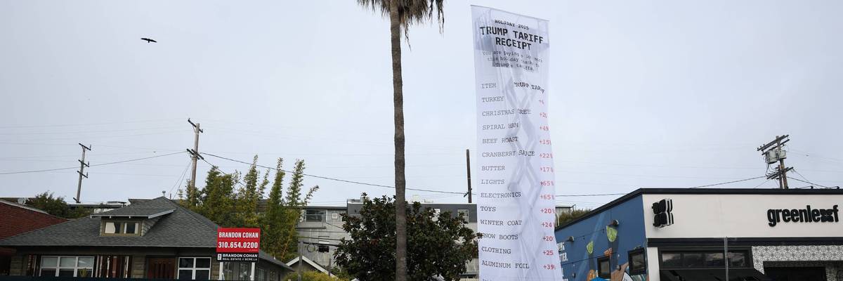MoveOn protests against President Donald Trump's tariffs with a 40-foot-long banner resembling a receipt