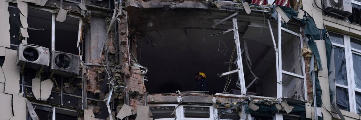 Multistory residential building damaged by shrapnel from a downed kamikaze drone of the Russian army