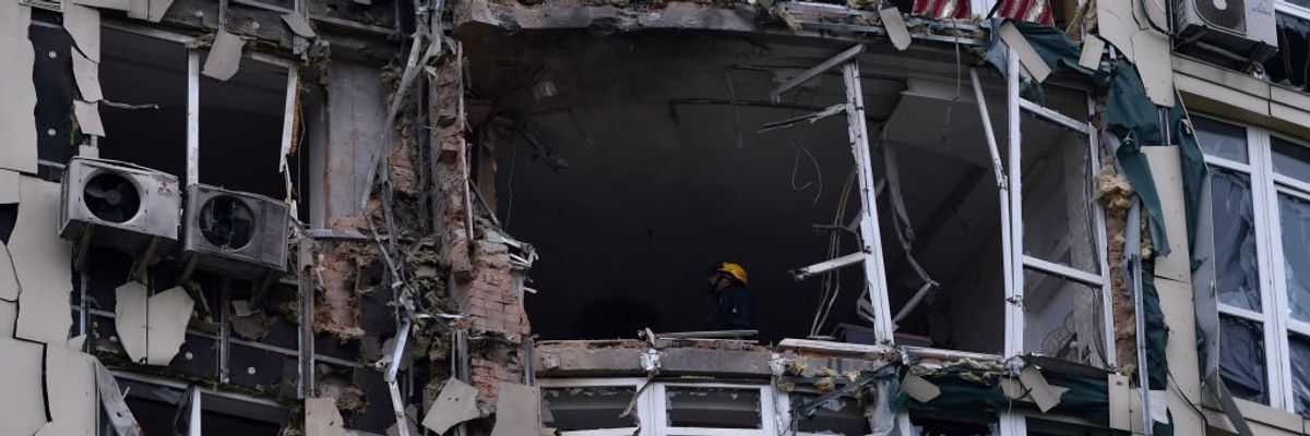 Multistory residential building damaged by shrapnel from a downed kamikaze drone of the Russian army