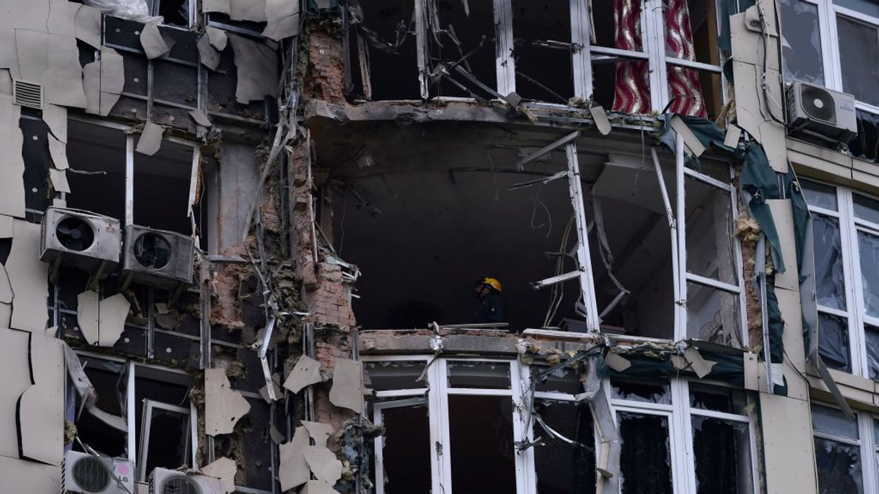 Multistory residential building damaged by shrapnel from a downed kamikaze drone of the Russian army