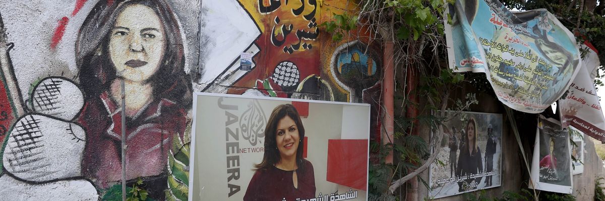 Murals and posters with the portrait of Shireen Abu Akleh, an Al Jazeera reporter killed by Israeli forces last year, are seen at the area where she died in Jenin, West Bank on April 30, 2023. 