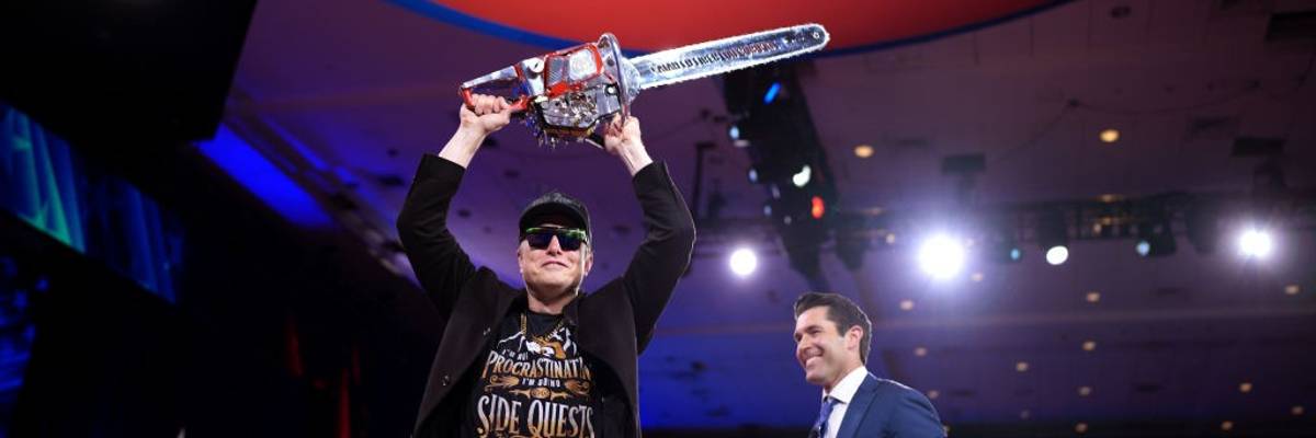 Musk holds chainsaw at CPAC