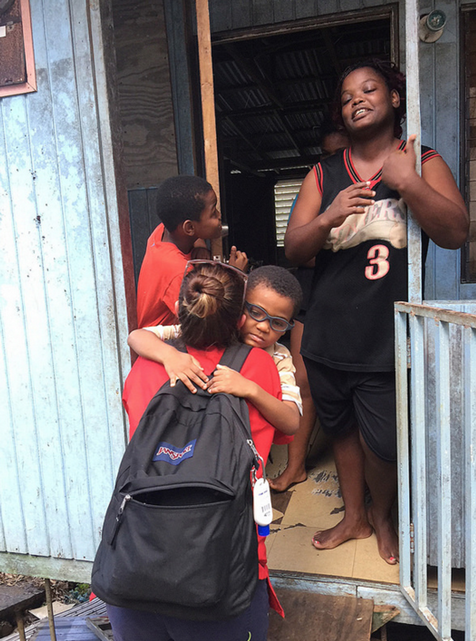 n the southern edge of #SanJuan municipality, where there's been no contact w/FEMA or official relief. RN Lucia Lopez treated the youngest child in this family for a rash due to sleeping in a roofless house on soaking wet furniture for weeks.