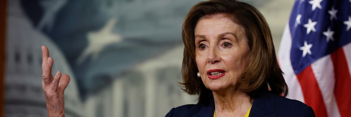 Nancy Pelosi speaking to reporters