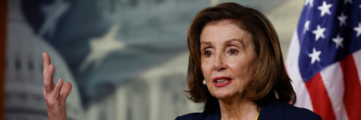 Nancy Pelosi speaking to reporters