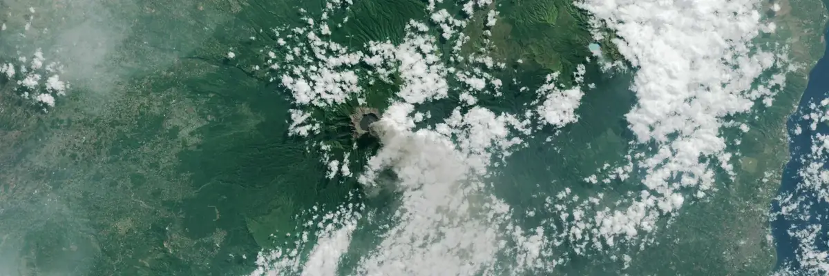 NASA satellite image of volcano and clouds