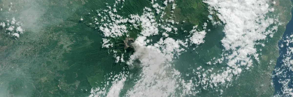NASA satellite image of volcano and clouds