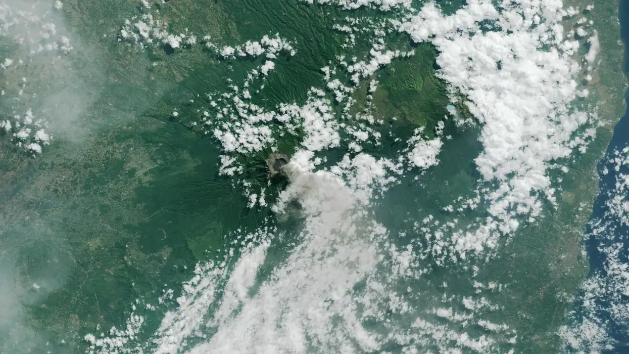 NASA satellite image of volcano and clouds