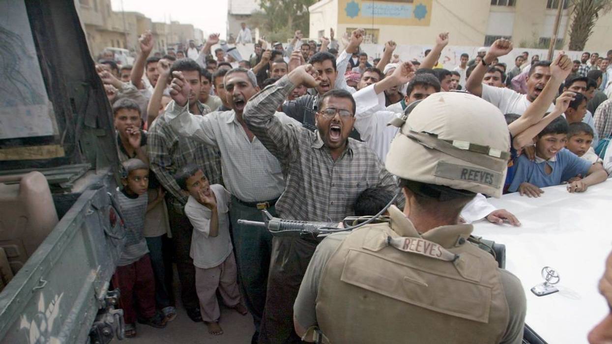 Nasariyah residents protest 15 April, 2003 the presence of US troops in Iraq.
