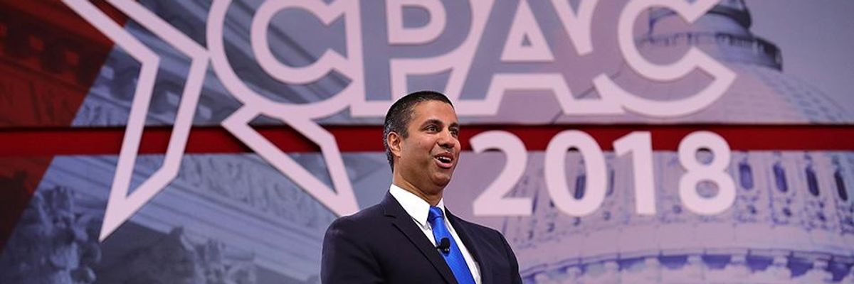 FCC Chair Accepts NRA's "Charlton Heston Courage Award" for Trying to Kill Net Neutrality