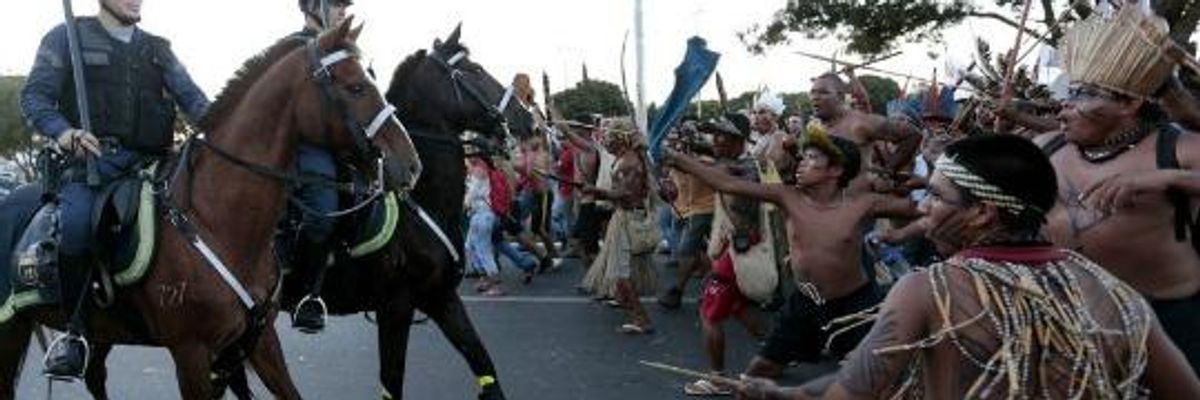 Indigenous Protesters Take Aim at World Cup 'Injustice' with Bows and Arrows