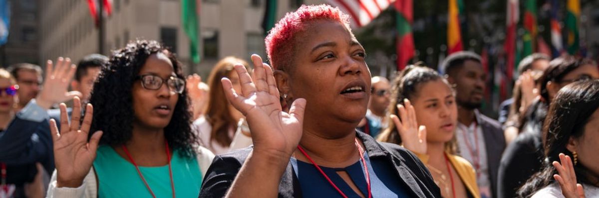 Naturalization Ceremony Held For 50 New Citizens At Rockefeller Center In NYC