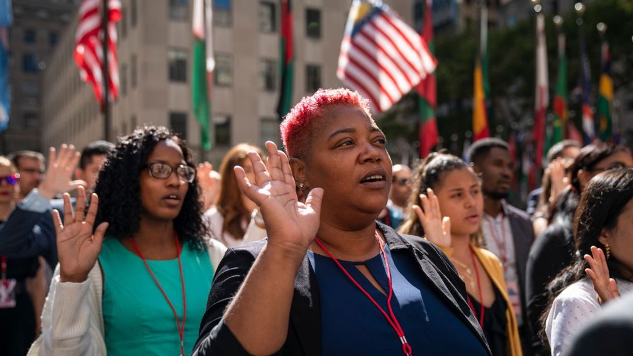 Naturalization Ceremony Held For 50 New Citizens At Rockefeller Center In NYC