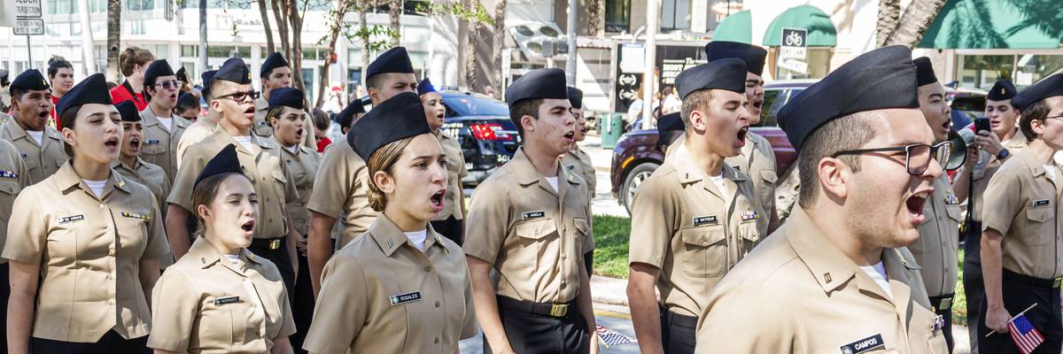 Naval JROTC cadets take part in a Veterans Day parade