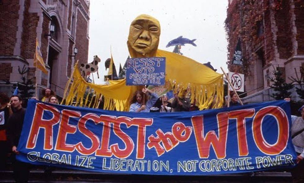 Neighborhood marches prepare for mass protest at the WTO in Seattle in 1999. (Photo: Dana Schuerholz)