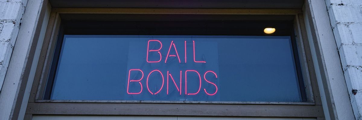 neon bail bond sign in window