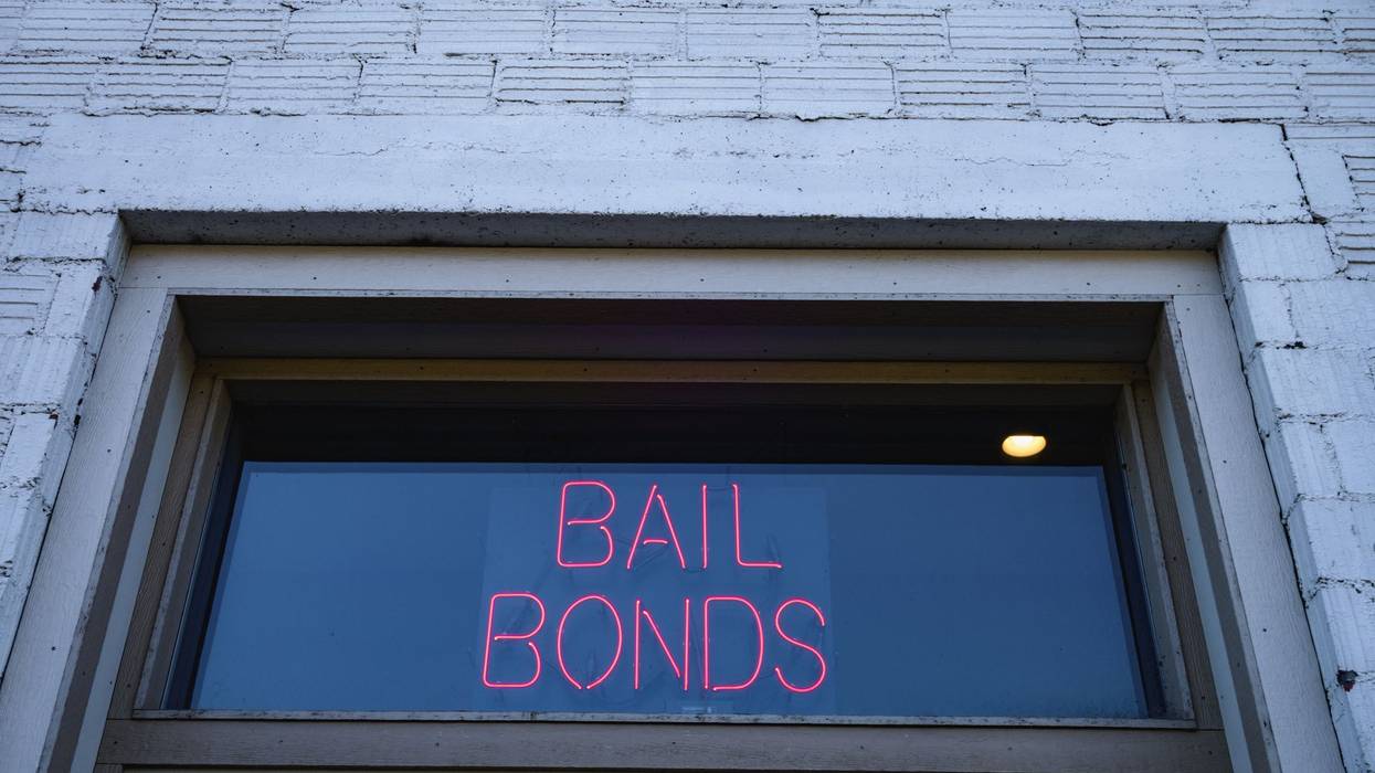 neon bail bond sign in window