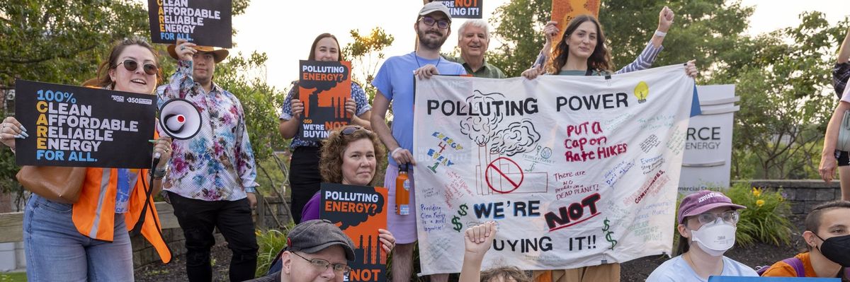 New Hampshire residents protest rate hikes and call for clean energy.