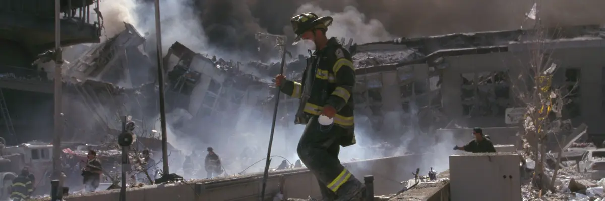 New York Firefighters amid the rubble of the World Trade Centre following the 9/11 attacks.