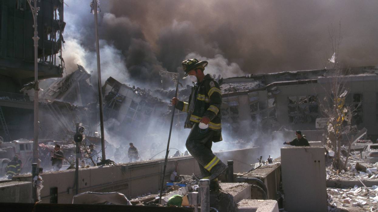 New York Firefighters amid the rubble of the World Trade Centre following the 9/11 attacks.