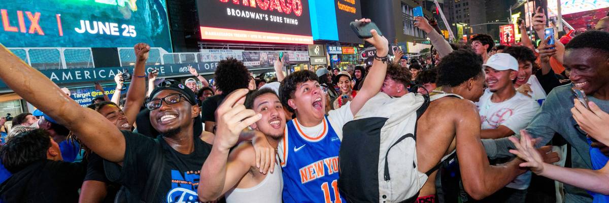 New York Knicks fans celebrate in Times Square.