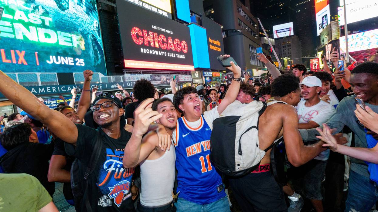 New York Knicks fans celebrate in Times Square.