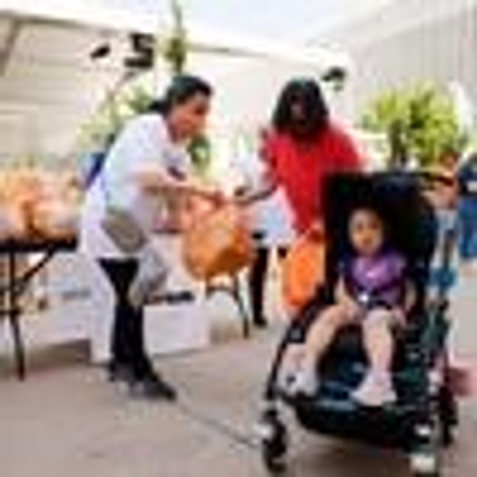 New Yorkers receive food at a food distribution event