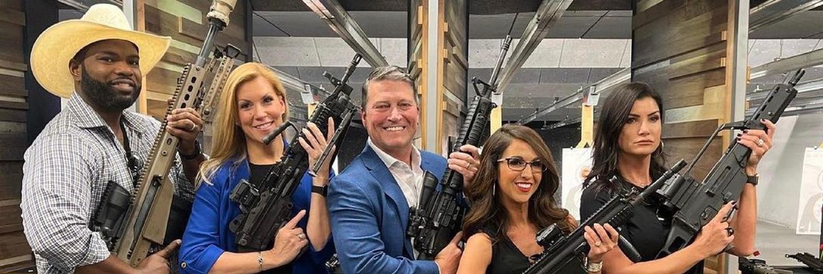 Newly elected GOP Congresspeople and NRA hack Dana Loesch happily pose with assault weapons