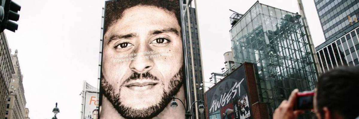 Nike ad campaign billboard featuring NFL quarterback Colin Kaepernick