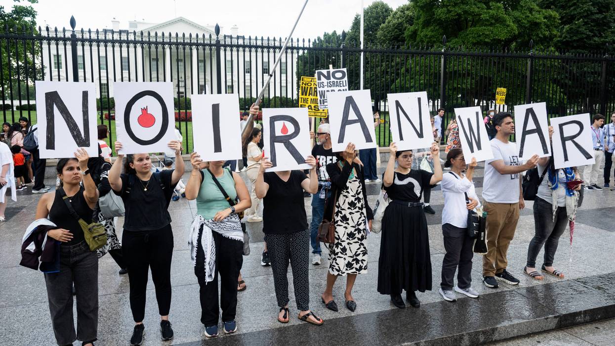 "No Iran War" says sign
