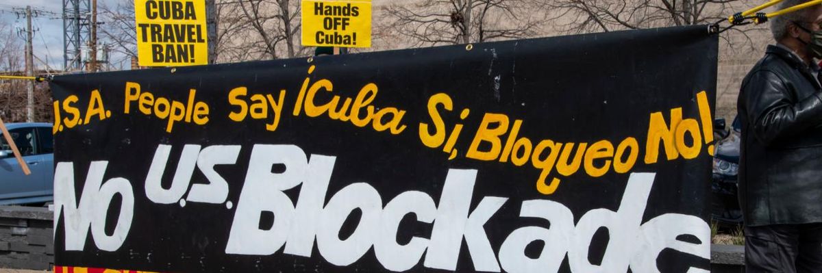 "No US Blockade of Cuba" sign at a protest