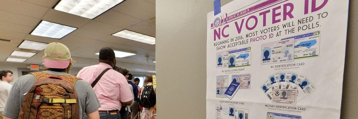 North Carolina State University students wait in line to vote