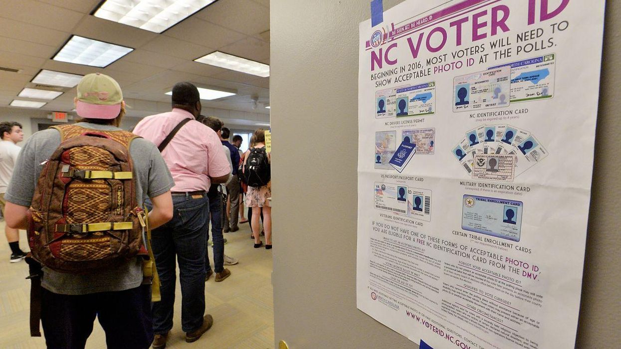 North Carolina State University students wait in line to vote
