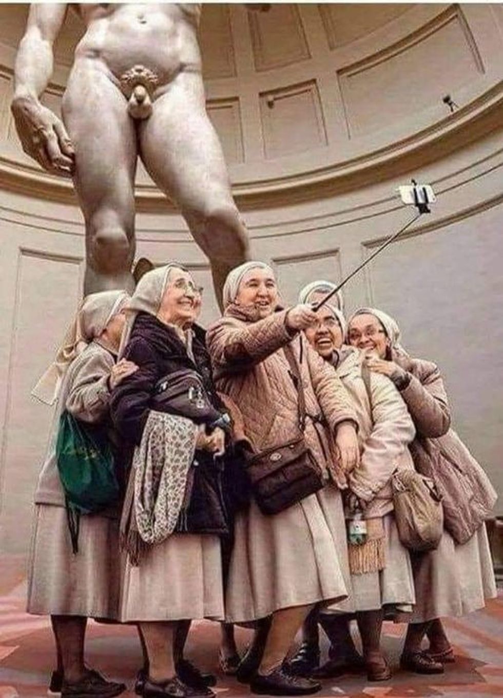 Nuns take selfies in front of Michelangelo's David